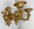 Up for sale is a large pair of antique 19th century Italian gilt-wood figural wall sconces. The sconces are intricately...