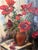 Original signed 1946 oil on canvas depicting red poppies in a vase. Presented in a gilt frame with vibrant color,...