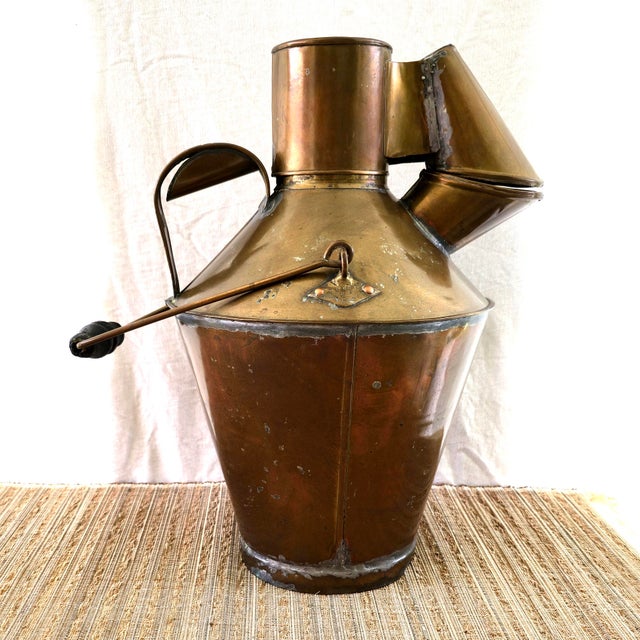 Rare working olive oil separator from the Alentejo, Portugal, hand-formed in brass by Florencio Pires of Ponte de Sor....