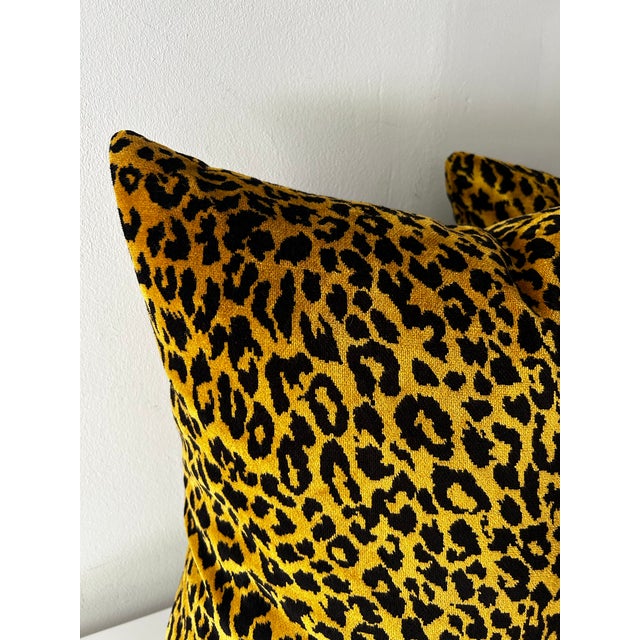 Pair of lush, chenille pillows, in a rich, saturated gold base with black leopard print. Classic opulence. Removable cover...