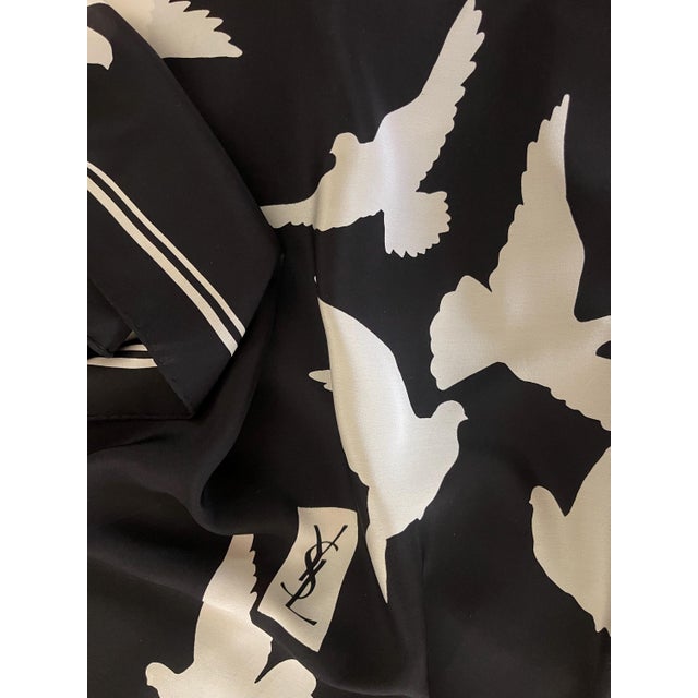 Yves Saint Laurent YSL Black Bird Silk Scarf. This beautiful scarf is in pristine condition, the color are simple yet...