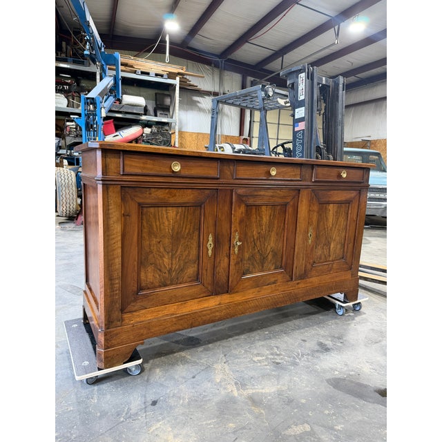 This is such a beautiful and unique server! This piece is of French make, and dates to the 19th century. The wood has...