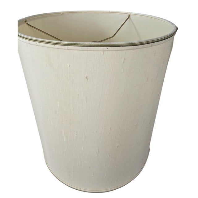 A vintage Stiffel drum lamp shade in textured ivory fabric with a natural slub weave. Self trim with a thin double-stripe...