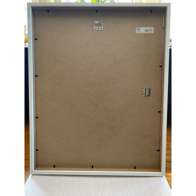 This is a matted and framed 21 inch by 17" (framed measurements) mixed media collage that includes various papers,...