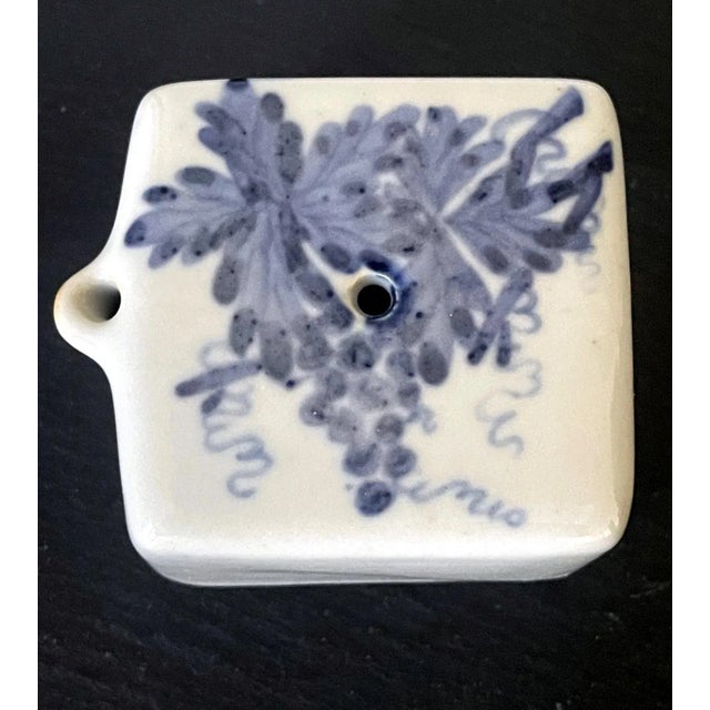 A small Korean ceramic water dropper in square form circa 19th century late Joseon Dynasty. It features an underglaze blue...