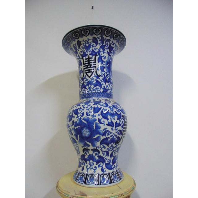 Chinese porcelain vase , white base color with blue designs