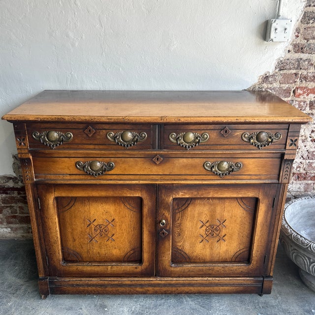 Gorgeous solid antique oak sideboard. Highly detailed art nouveau style handcrafted two top drawers, one large middle...