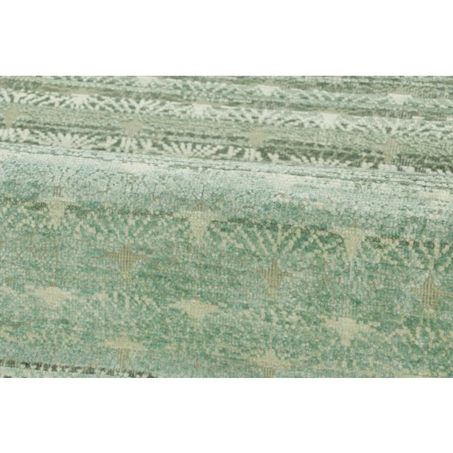 Made with hand-knotted natural silk, this 2x8 runner rug is a sophisticated addition to Rug & Kilim’s Block Print...