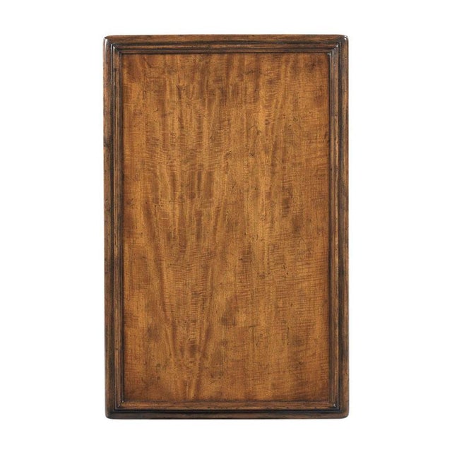 A rectangular molded top is veneered with rich prima vera placed over four stylized bamboo legs joined by a low shelf...