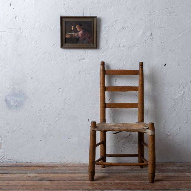 Helen Hyde (American, 1868-1919) Watercolor on paper depicting a girl reading by candlelight, circa 1900. sight: 8 ½ by 7...