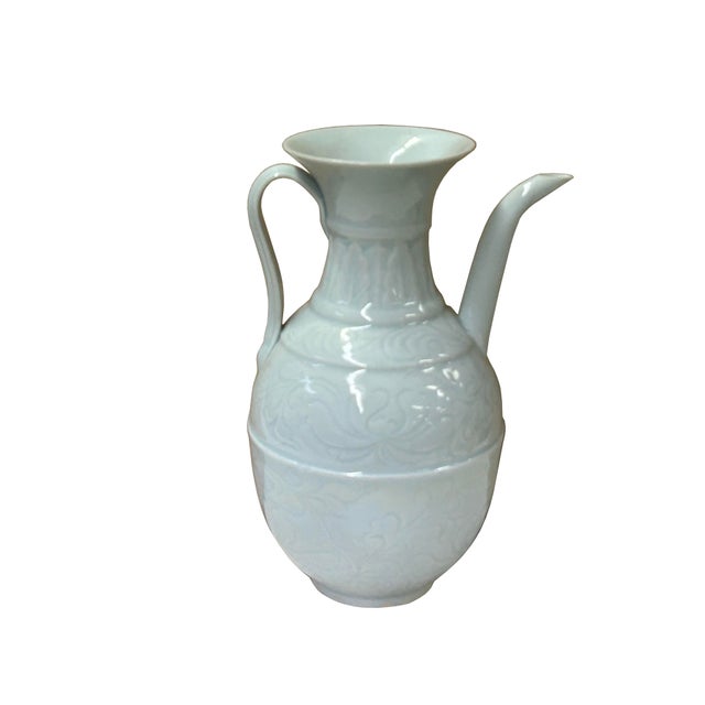This elegant Chinese celadon glazed porcelain vase jar showcases a refined Ming-style aesthetic, featuring a pale, sea-...