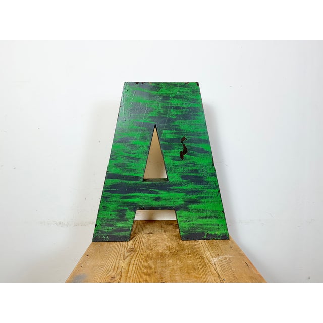 This vintage industrial facade letter “ A “was made during the 1970s in former Czechoslovakia and comes from an old...