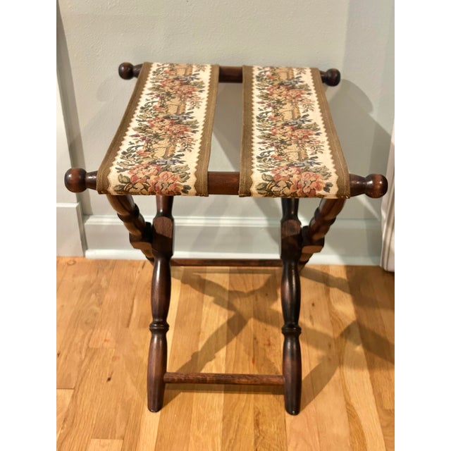 Traditionally these folding luggage racks are used at the foot of a bed in a guest room… but maybe use this one to hold...