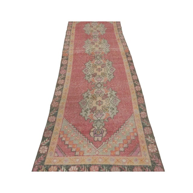 Vintage handknotted washed out rug from Konya region of Turkey. Approximately 50-60 years old. In very good condition.