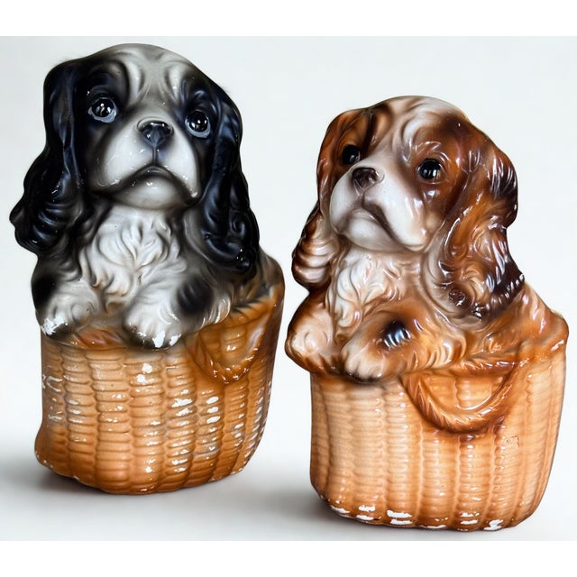 In Trompe L'Oleil baskets, here is a pair of vintage King Charels Spaniel figures in the form of a coin bank and floral...