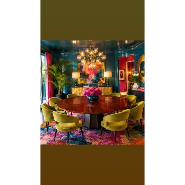 A striking statement dining table designed by Thomas Pheasant for Baker Furniture, showcasing the designer’s sophisticated...