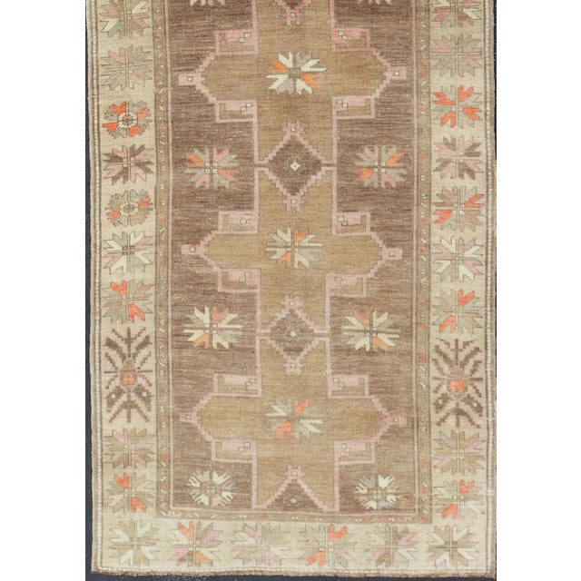Measures: 4'6 x 13'1 Vintage Turkish Kars Gallery Rug with Soft Taupe and Mocha Geometric Design. Keivan Woven Arts /...