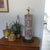 Make a bold statement with this substantial vintage Mid-Century ceramic table lamp featuring an elegant cylindrical form...