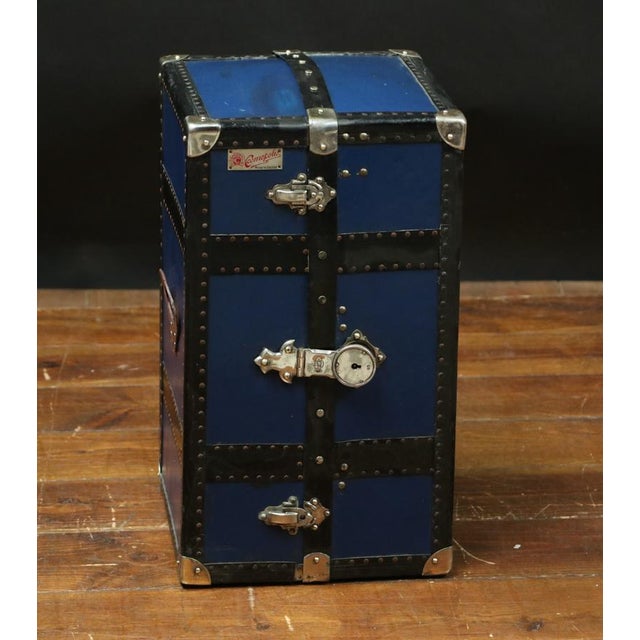 Blue Wardrobe Trunk for Dolls from the Cosmopolis Brand, 1920s, in Very Good conditions. Designed 1920 to 1949 This piece...