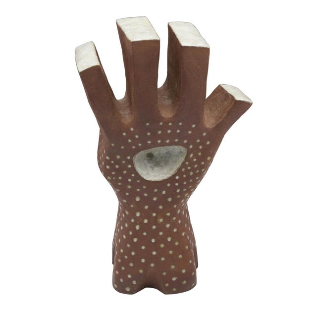 Leza McVey Surrealist "Eye in Hand" Ceramic Sculpture, 1977 Partially glazed stoneware Signature: Signed "Leza" inside the...