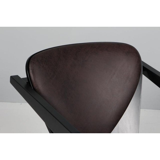 Hans j. Wegner lounge chairs new upholstered with mokka aniline leather. Frame of solid new black lacquered beech. Model...
