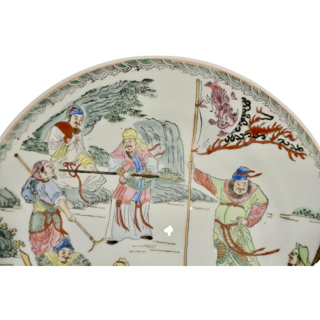 Large 11 inch hand painted tray depicting Asian warrior battle training in jade green, iron. red, sienna, blue, raspberry...