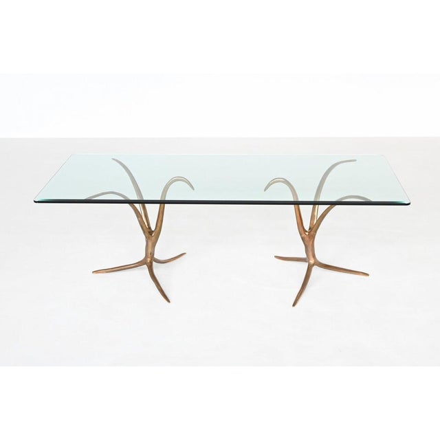 This sculptural dining table was created by a Belgian artist in the 1970s and stands as a striking example of artistic...