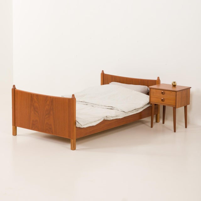 This vintage mid-century child teak bed was made some time in 1960s in Denmark. This piece features a teak frame...
