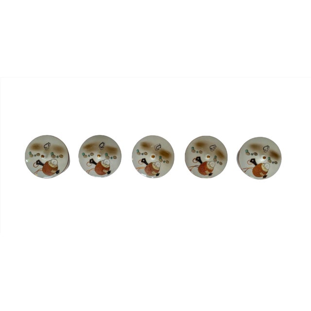 Ok, these are ADORABLE! There’s just no other word for it! This set of five lidded Japanese porcelain teacups features a...