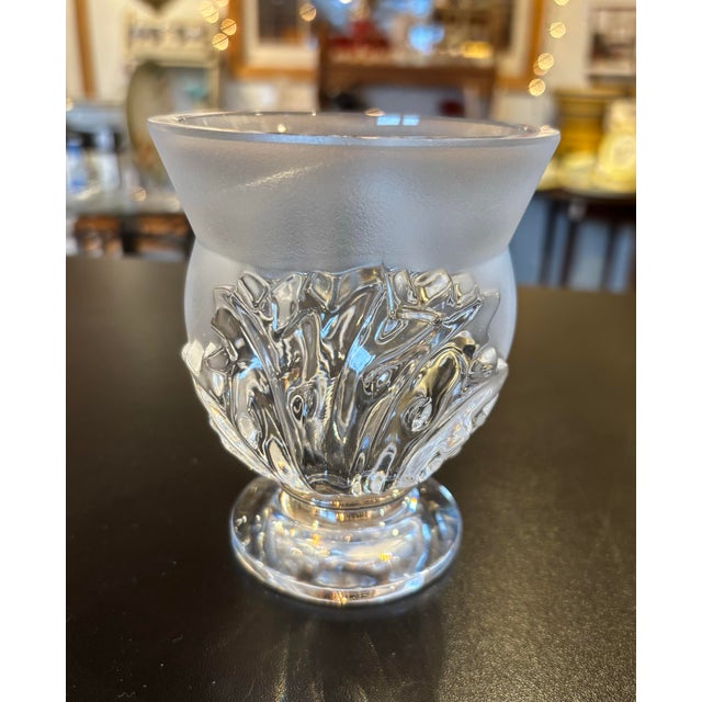 This is a stunning signed Lalique vase. The model is called “Saint Cloud” and was designed by Marc Lalique in 1952. It...