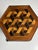French Marquetry side table with drawer. Mahogany veneered and the top is inlaid with various types of wood. Signs of use...