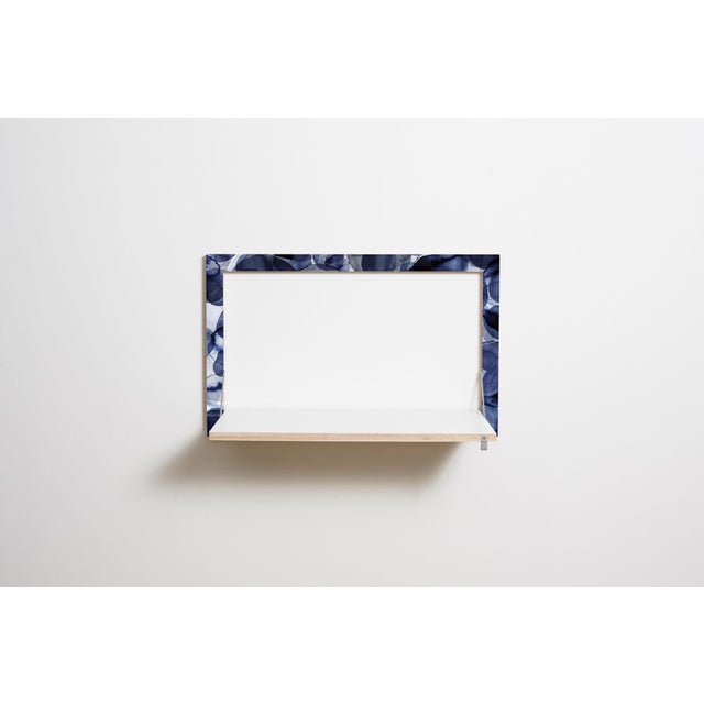 Wall art, workstation functional and discreet, this fläpps wall desk makes the perfect seated or standing workstation...