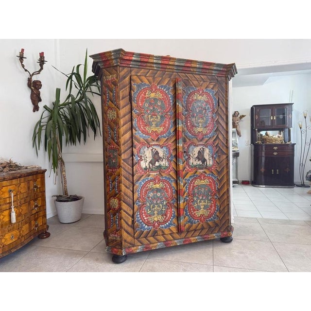 Original, rustic farmhouse cupboard, Biedermeier style. Dimensions: Height x Width x Depth 186 x 155 x 65 cm. This is a...