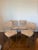 A set of four vintage chrome dinette chairs, newly reupholstered in soft tan and cream tiger-print chenille. The plush...