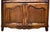 Offered here is an antique Louis XV-style carved walnut sideboard. The warm, rich patina and the period hinge hardware...