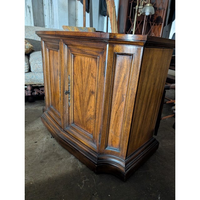 Transform your entertaining space with this sophisticated vintage bar cabinet, ideal as a serving station or compact home...