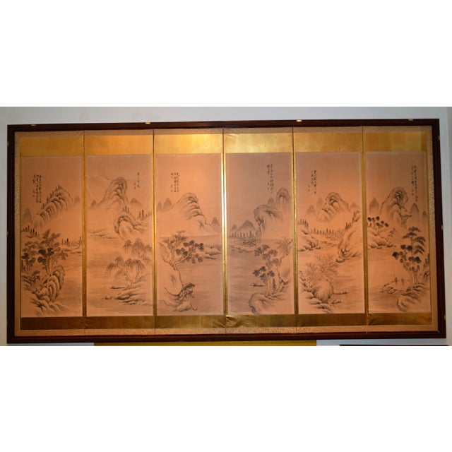 Dynamic six individual signed suibokuga ink paintings on paper mounted onto a six panel wood frame screen of Chinese...