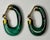 This is a beautiful pair of 14K yellow gold lever-back clip earrings with malachite elongated hoops.