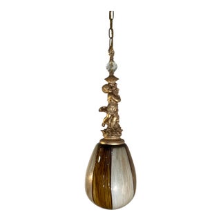 Murano Art Glass Aventurine Ovoid Shade With a Cherub Sculpture Pendant Light For Sale