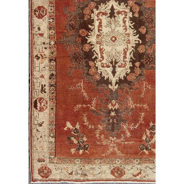 Antique Turkish Oushak Rug With Terracotta Field, Cream, and Soft Brown Accents For Sale - Image 4 of 8