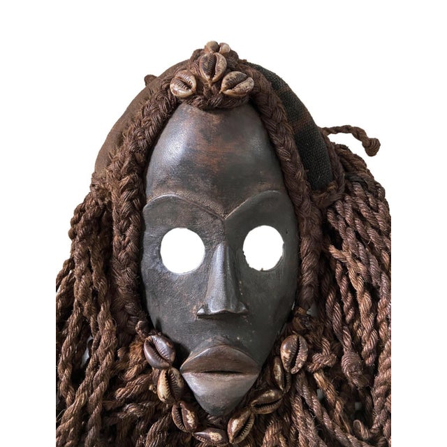 This exceptional piece of African art is a ceremonial dance mask from the Dan people of the Ivory Coast, including their...