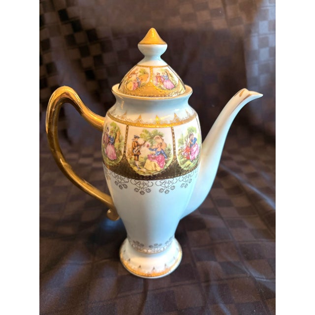 Coffee pot from Royal Vienna by ARNART “Love Story” Collection with hand-painted 'courting' scenes. From vintage...