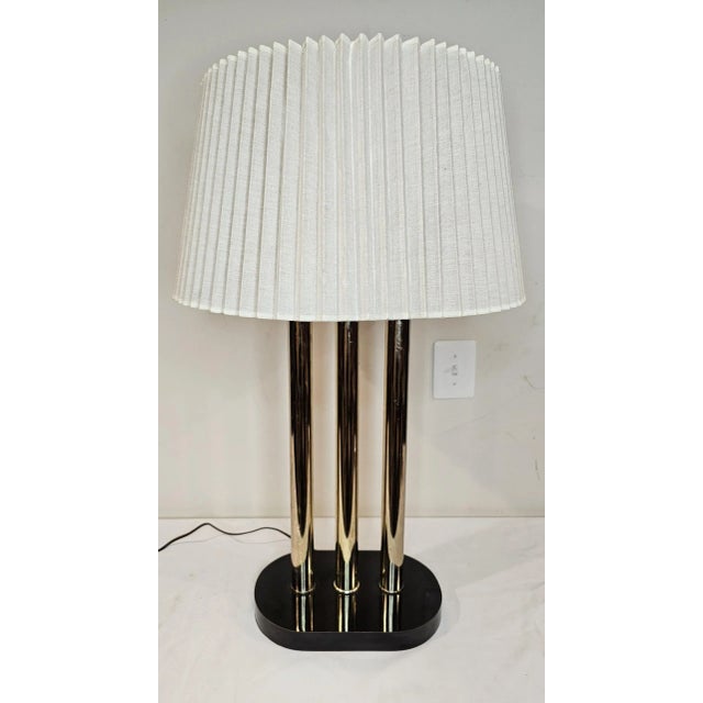 This Vintage Tall Hollywood Regency Brass Candelabra Table Lamp has both classic and contemporary elements, starting with...