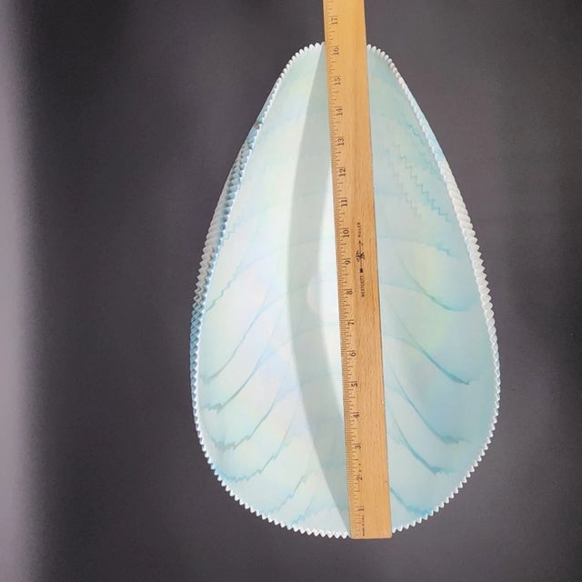 Bring a sense of elegance and serenity to your décor with this **Vintage Murano Style Art Glass Shell-Shaped “Tranquility”...