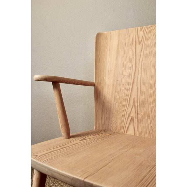 A beautiful Swedish pine armchair designed by Göran Malmvall for Svensk Fur / Karl Andersson & Söner, Sweden, circa...