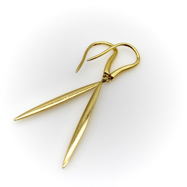 This is a retired Tiffany & Co. earring made from the 1990’s until 2003, called the Feather Drop. It features an elongated...