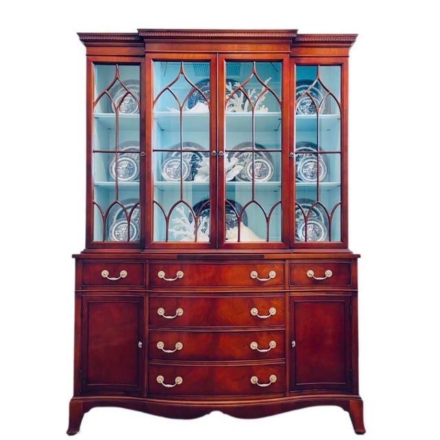 Flamed Mahogany Breakfront China Closet Cabinet Bookcase, circa 1940s -50. The center of attention - a very fine...