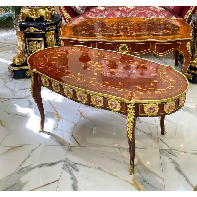 Create memories in a space that reflects your personality. This beautiful French-style coffee table features a rich...