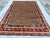 This exquisite hand-knotted wool area rug features a classic Sultanabad design with an elegant Chobi finish. The central...