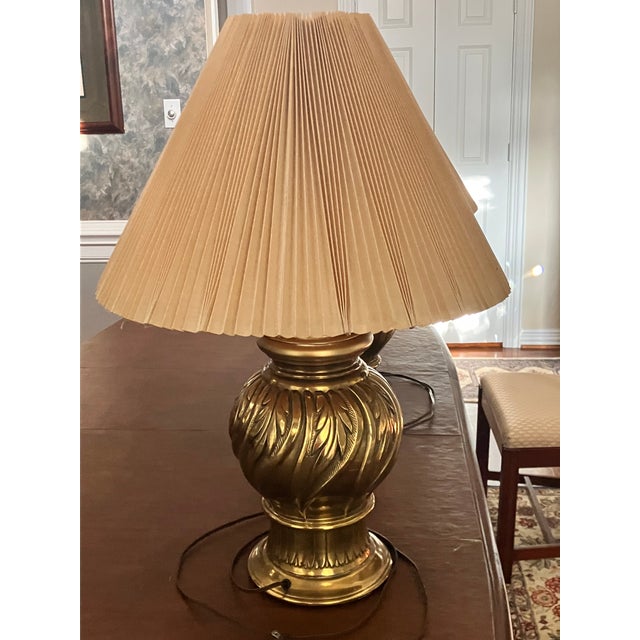 Vintage gold finished brass lamps with carved leaf design